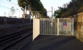 Example from France (Paris)(The fence includes an emergency gate and is used in conjunction with a prohibitive sign.