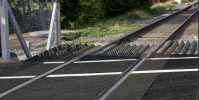 (Rubber panels next to a level crossing